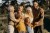 medium-shot-family-members-posing-together.jpg